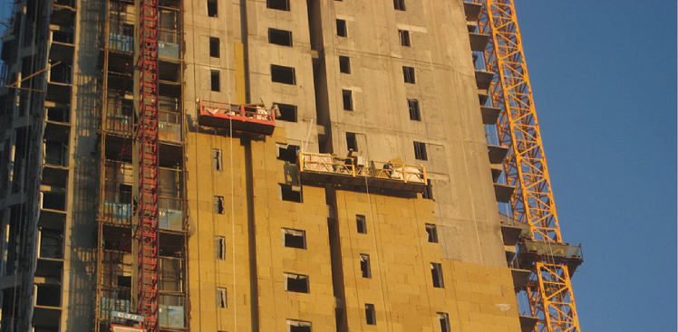 ‌建筑高度与外墙保温材料防火等级的关系